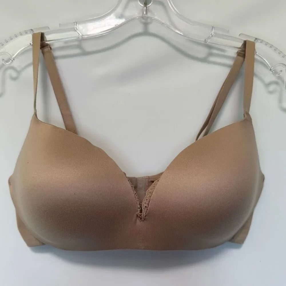 C 37 - victoria’s Secret plunge padded wire free tan bra size 34D